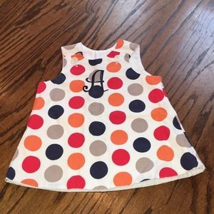 Monogram “A” polka dot dress